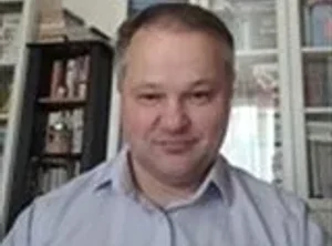 Николай